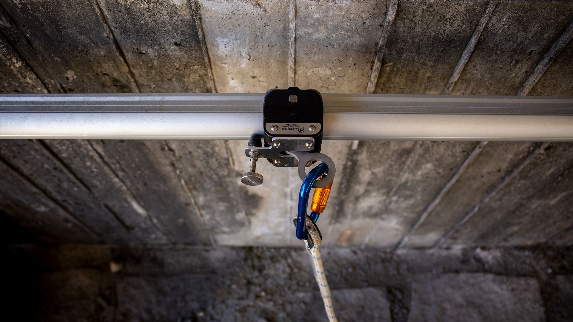 Fall arrest rail restraint highway cleaning