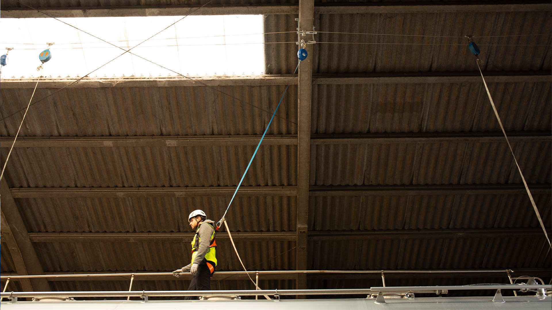 Overhead lifeline over trucks